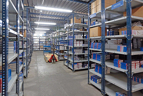 Slotted angle steel shelving in Sharjah warehouse